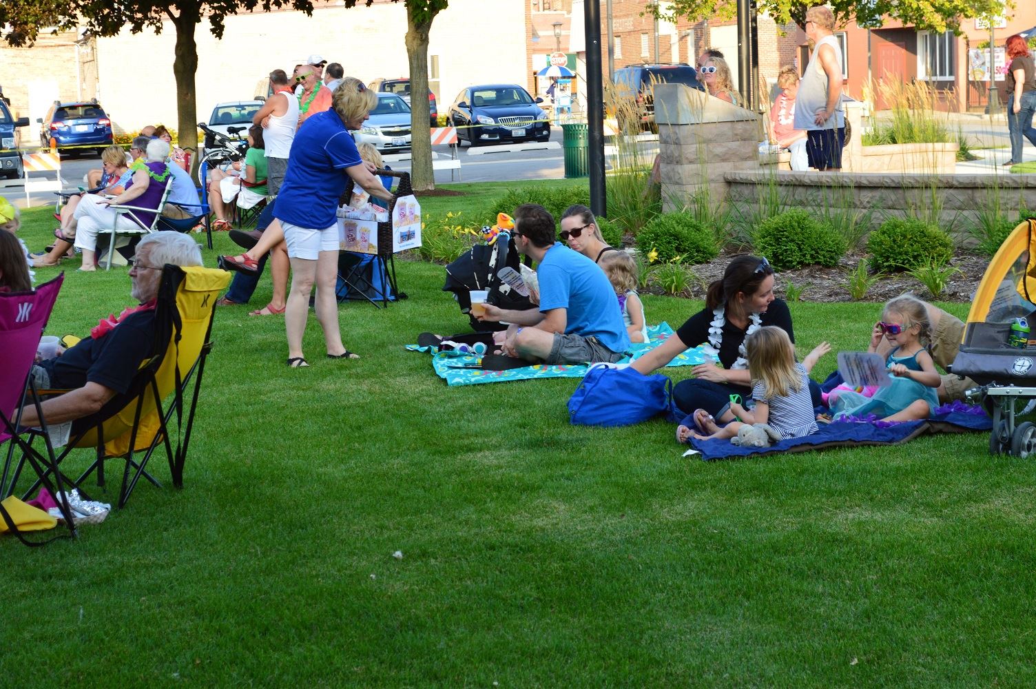 Community members sit on blankets and chairs at Cortesi Veterans Memorial Park to watch Mr. Meyers band perform Aug. 4, 2016.
